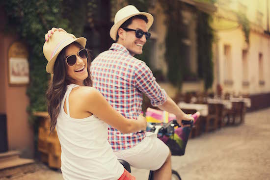 Couple riding bike